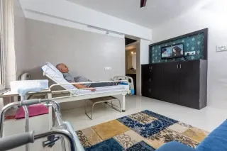 Care companion conversing gently with a senior resident